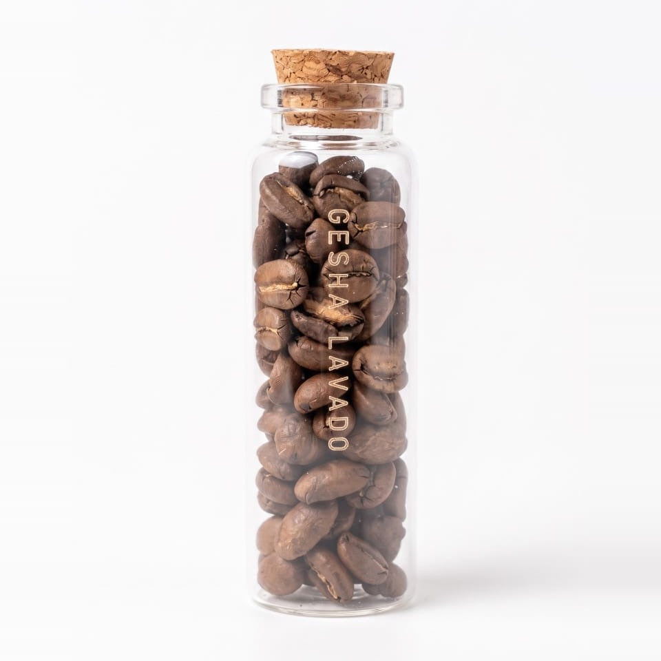 Tubo de vidrio con 16 g de café en grano, regalo del Club P23